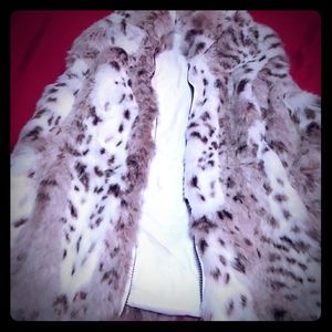 Brand new faux fir and leather vest
